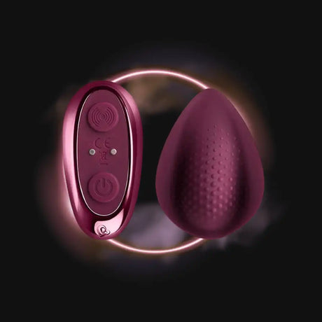 Burgundy egg-shaped vibrator and remote.