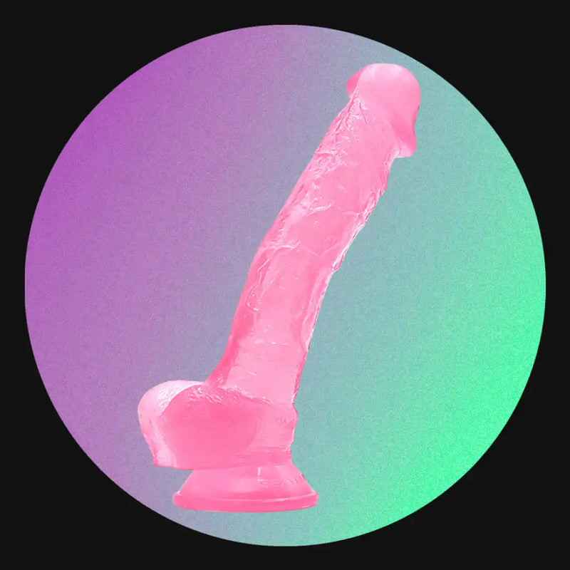 Pink silicone dildo with suction cup base.