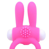 用兔子耳朵旋转粉红色